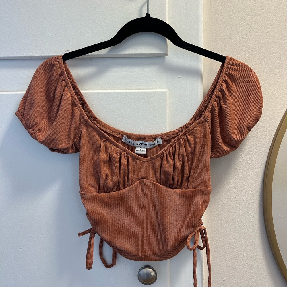 Off the shoulder rust blouse. Cropped with tie side detail size small